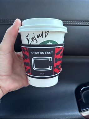 limited-edition Starbucks reusable cup sleeve USA soccer captain armband design